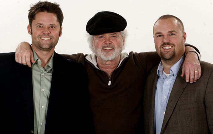 Shane Osmond poses for a picture with his father Merrill and brother Justin.